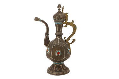 Lot 253 - AN ENGRAVED TURQUOISE AND RED GLASS-SET COPPER EWER