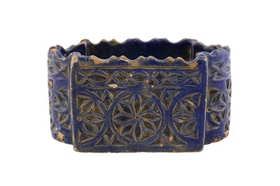 Lot 233 - A MOULDED MONOCHROME COBALT BLUE-GLAZED POTTERY INKWELL