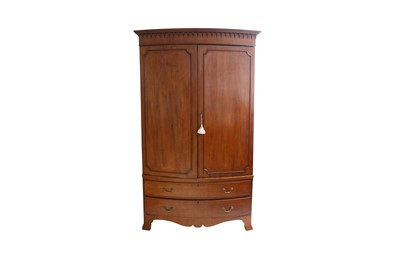 Lot 548 - A LATE 19TH CENTURY MAHOGANY BOW FRONT WARDROBE