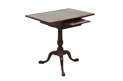 Lot 517 - A GEORGE III MAHOGANY READING TABLE