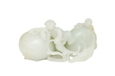 Lot 118 - A CHINESE PALE-CELADON JADE 'BOYS AND POMEGRANATES' WATER DROPPER