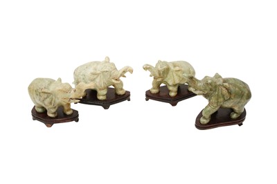 Lot 214 - FOUR CHINESE HARDSTONE ELEPHANTS, 20TH CENTURY