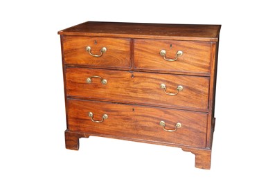 Lot 534 - A GEORGE III MAHOGANY CHEST OF DRAWERS