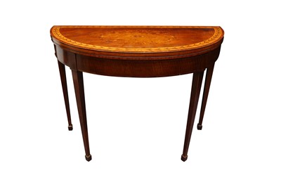 Lot 503 - A GEORGE III SHERATON STYLE MAHOGANY AND CROSSBANDED DEMI LUNE CARD TABLE