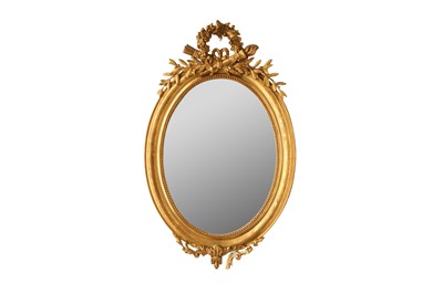 Lot 451 - A FRENCH GILT OVAL MIRROR