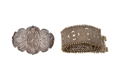 Lot 55 - A SILVER BELT AND A BROOCH