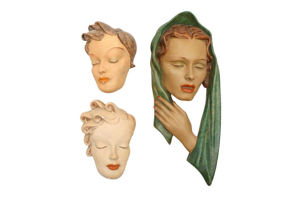Lot 32 - UNKNOWN (EUROPEAN): THREE CERAMIC WALL HANGING MASKS