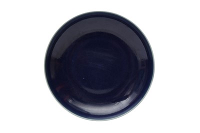 Lot 662 - A CHINESE MONOCHROME BLUE-GLAZED DISH
