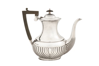 Lot 302 - An Elizabeth II sterling silver coffee pot, Sheffield 1965 by Ewart, Perkins & Co Ltd