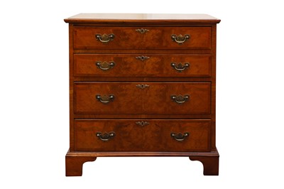 Lot 509 - A GEORGIAN STYLE WALNUT BACHELORS CHEST
