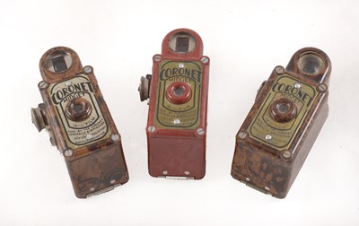 Lot 99 - A Red & Two Mottled Brown Coronet Midget Cameras.