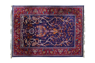 Lot 311 - A PERSIAN DESIGN  MACHINE MADE CARPET