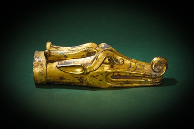Lot 78 - A CHINESE INLAID GILT-BRONZE 'DRAGON' FITTING