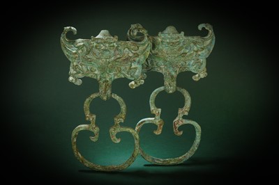 Lot 180 - A PAIR OF CHINESE BRONZE COFFIN HANDLES