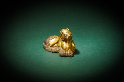 Lot 191 - A CHINESE GILT-BRONZE 'LEOPARD' FIGURE