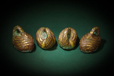 Lot 90 - A RARE SET OF FOUR CHINESE GOLD- AND SILVER- INLAID BRONZE 'GOOSE' MAT WEIGHTS