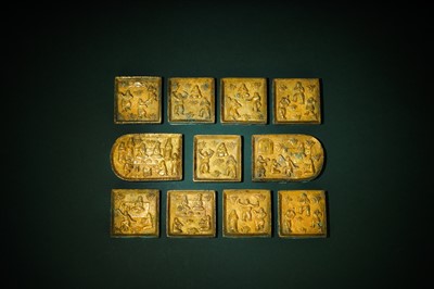 Lot 75 - A SET OF ELEVEN CHINESE GILT-BRONZE BELT PLAQUES