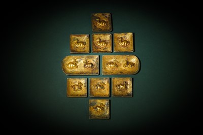 Lot 91 - A SET OF TEN CHINESE GILT-BRONZE 'DEER' BELT ORNAMENTS