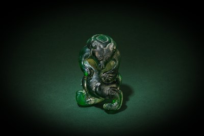 Lot 167 - A CHINESE GREEN GLASS FIGURE OF A BEAR