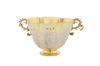 Lot 233 - An early 17th century German silver gilt twin handled cup, Augsburg 1625-1630 by David Roll (master 1605, d. between 1638-43)
