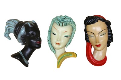 Lot 166 - A GROUP OF PAINTED PLASTER WALL HANGING MASKS