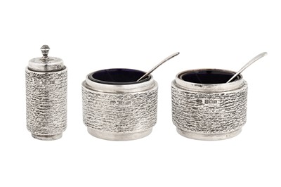 Lot 260 - An Elizabeth II modernist sterling silver three-piece cruet set, London 1973 by Deakin and Francis