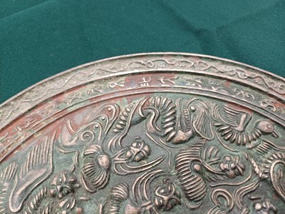 Lot 486 - A CHINESE BRONZE 'IMMORTALS' MIRROR