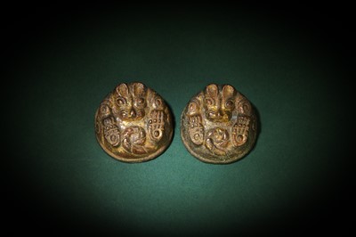 Lot 175 - A PAIR OF CHINESE GILT-BRONZE 'BEAR' MAT WEIGHTS