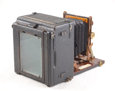 Lot 14 - A Houghtons, Sanderson 'De Luxe' Brass & Mahogany Camera.
