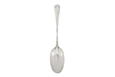 Lot 296 - A Queen Anne Britannia standard silver dessert spoon, London 1713 by Nathaniel Roe