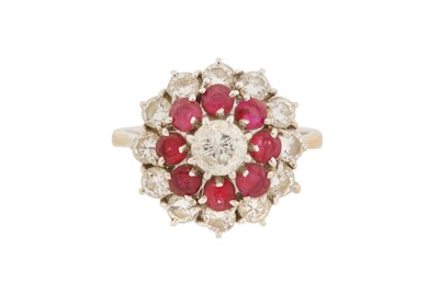 Lot 286 - A DIAMOND AND RUBY CLUSTER RING