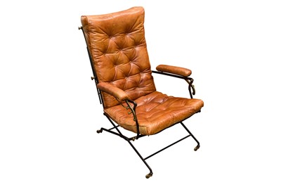 Lot 406 - A CAMPAIGN ARMCHAIR