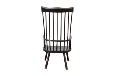 Lot 91 - AN 18TH CENTURY AND LATER EBONISED ASH AND ELM COMB BACK PROVINCIAL ARMCHAIR