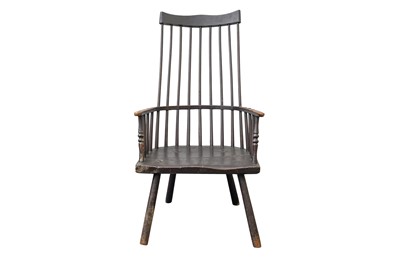 Lot 91 - AN 18TH CENTURY AND LATER EBONISED ASH AND ELM COMB BACK PROVINCIAL ARMCHAIR