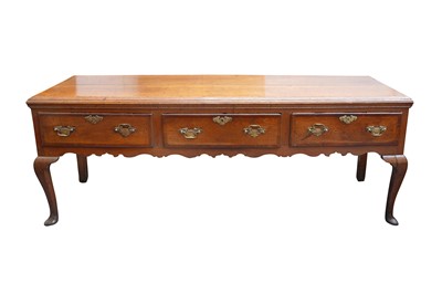 Lot 90 - A GEORGE III OAK DRESSER BASE