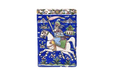 Lot 295 - TWO QAJAR POLYCHROME-PAINTED AND MOULDED POTTERY TILES