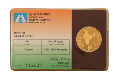 Lot 128 - A 24CT GOLD INDIAN COIN