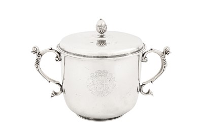 Lot 498 - A Charles II sterling silver covered twin handled porringer, London 1684 by Richard Marchant (free. 1671)