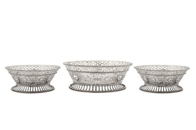 Lot 339 - A suite of three George V sterling silver replica baskets, London 1926 by Carrington and Co
