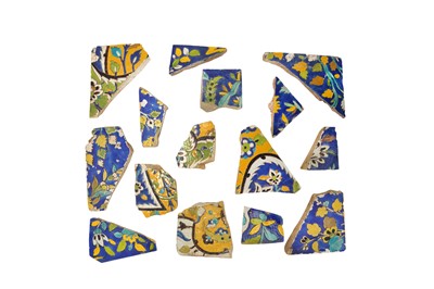 Lot 289 - FIFTEEN FRAGMENTS OF SAFAVID CUERDA SECA POTTERY TILES