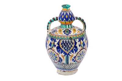 Lot 408 - A LARGE POLYCHROME-PAINTED TUNISIAN CHEMLA TWIN-HANDLED POTTERY JAR