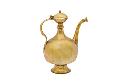 Lot 187 - A PLAIN MUGHAL INDIAN BRASS AFTABA (EWER)