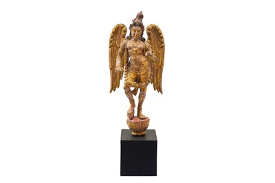 Lot 107 - A CARVED WOODEN GILT AND POLYCHROME-PAINTED STATUE OF A WINGED APSARA