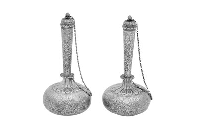 Lot 191 - A PAIR OF INDIAN MINIATURE SILVER SURAHI BOTTLES