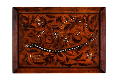 Lot 234 - λ AN IVORY-INLAID HARDWOOD FURNITURE PANEL WITH BOLD NASTA'LIQ CALLIGRAPHY