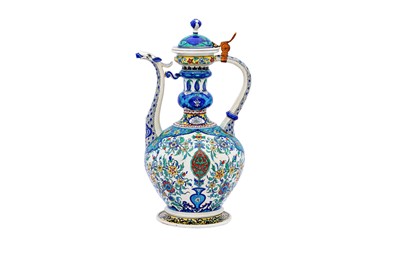 Lot 405 - AN IZNIK-STYLE POLYCHROME-PAINTED SAMSON POTTERY SPOUTED EWER