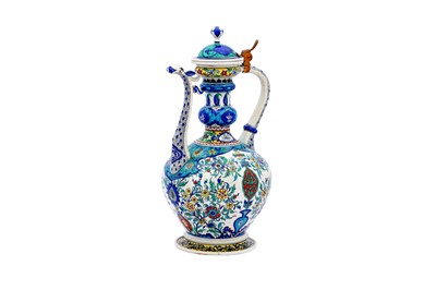 Lot 405 - AN IZNIK-STYLE POLYCHROME-PAINTED SAMSON POTTERY SPOUTED EWER