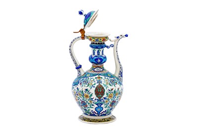 Lot 405 - AN IZNIK-STYLE POLYCHROME-PAINTED SAMSON POTTERY SPOUTED EWER