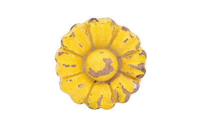 Lot 269 - A MOULDED YELLOW-GLAZED MUGHAL ARCHITECTURAL FLORAL TILE