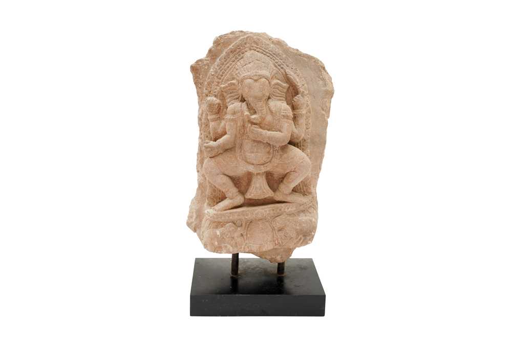 Lot 3 - A SMALL CARVED SANDSTONE STELE WITH FOUR-ARMED GANESHA